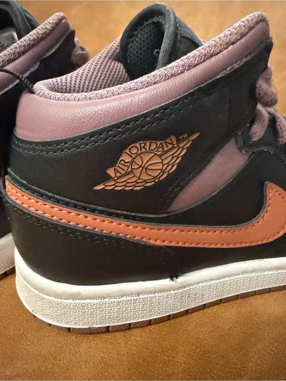 Jordan Nike Kids' Mid-Top Sneakers in Black, Mauve, and Orange. Size 3Y